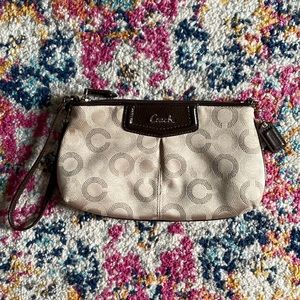 Coach clutch with C’s